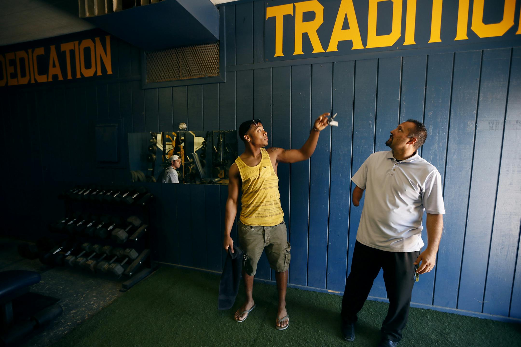 Cedric Thompson talked with his high school football coach David Shaw at Calipatria High school on a recent trip . Thompson grew up in Compton. His freshman year at Piedmont High School, three people close to him (a cousin and two friends) were killed in gang shootings. His parents divorced, and his mother urged him to get out of L.A., and move with his dad in Bombay Beach, a forgotten outpost on the Salton Sea. CA] JERRY HOLT ‚Ä¢ jerry.holt@startribune.com