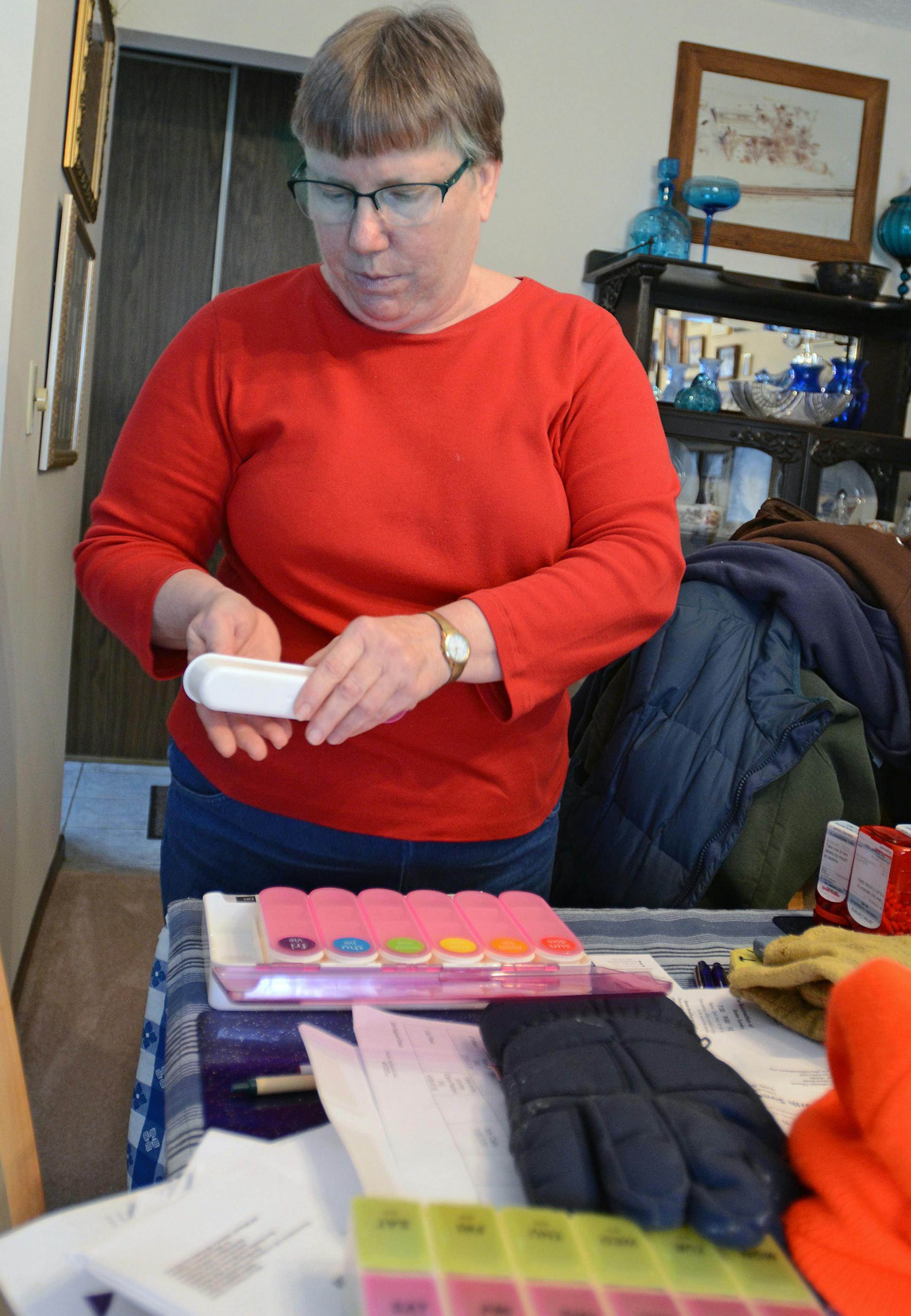 Meg Clemens got medication for her husband, Jim Clemens, who suffers from Parkinson's disease, Crohn's disease and ulcerative colitis. The Clemens live in Plymouth. ] Joey McLeister,Special to the Star Tribune, Plymouth,MN March 26,2016