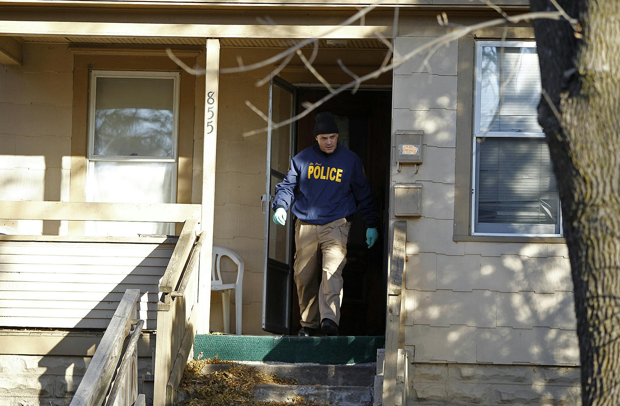 Police investigated the scene where a man was found shot to death early Tuesday in St. Paul's Dayton's Bluff neighborhood.