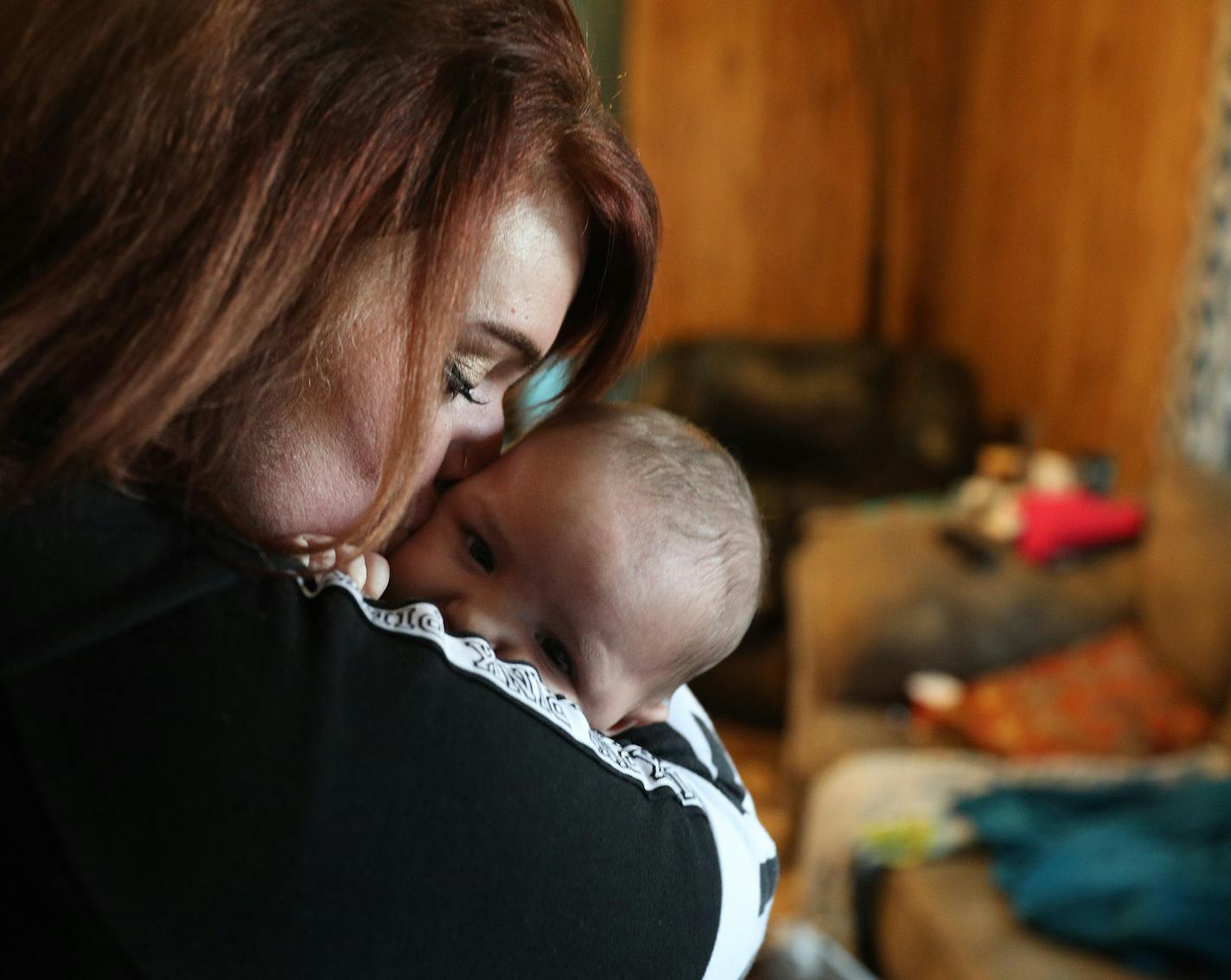 Ashley Benson, a mother of four who went through Sanford Bemidji Medical Center&#x2019;s First Steps program to help pregnant opioid addicts wean off their addictions, kissed her 4-month-old son, Grayson.