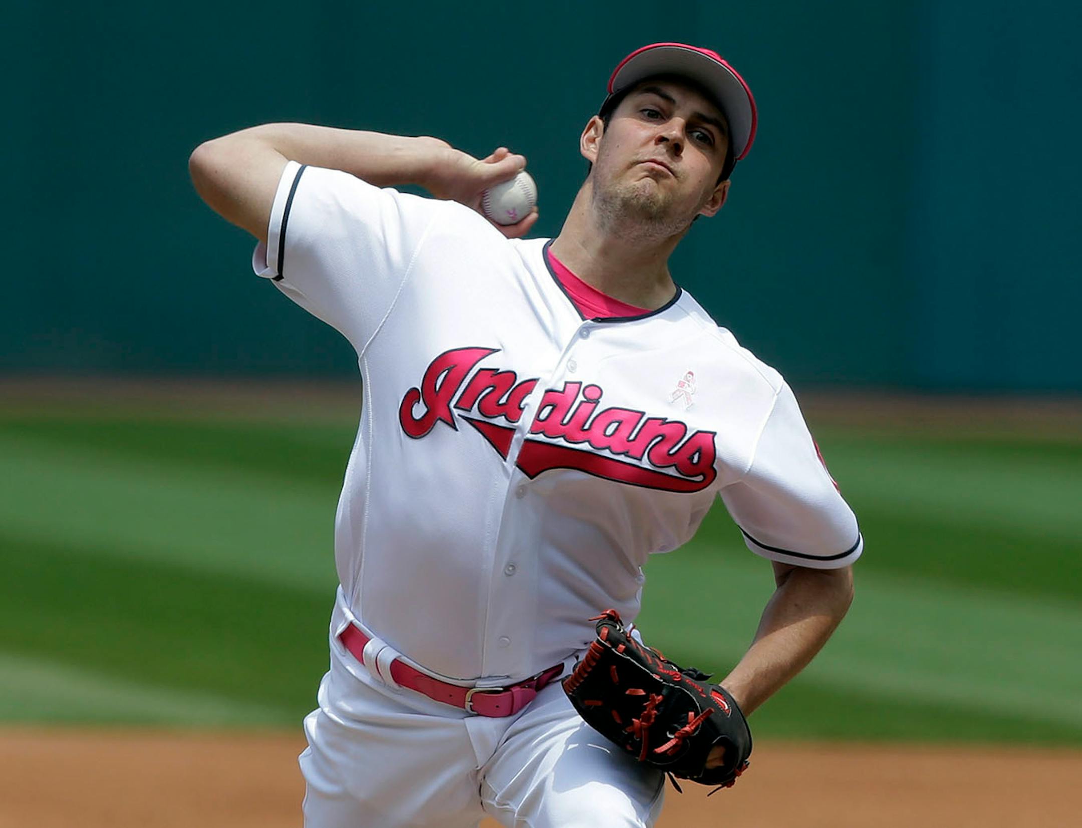 Cleveland Indians starting pitcher Trevor Bauer delivers in the first inning of a baseball game against the Minnesota Twins, Sunday, May 14, 2017, in Cleveland.