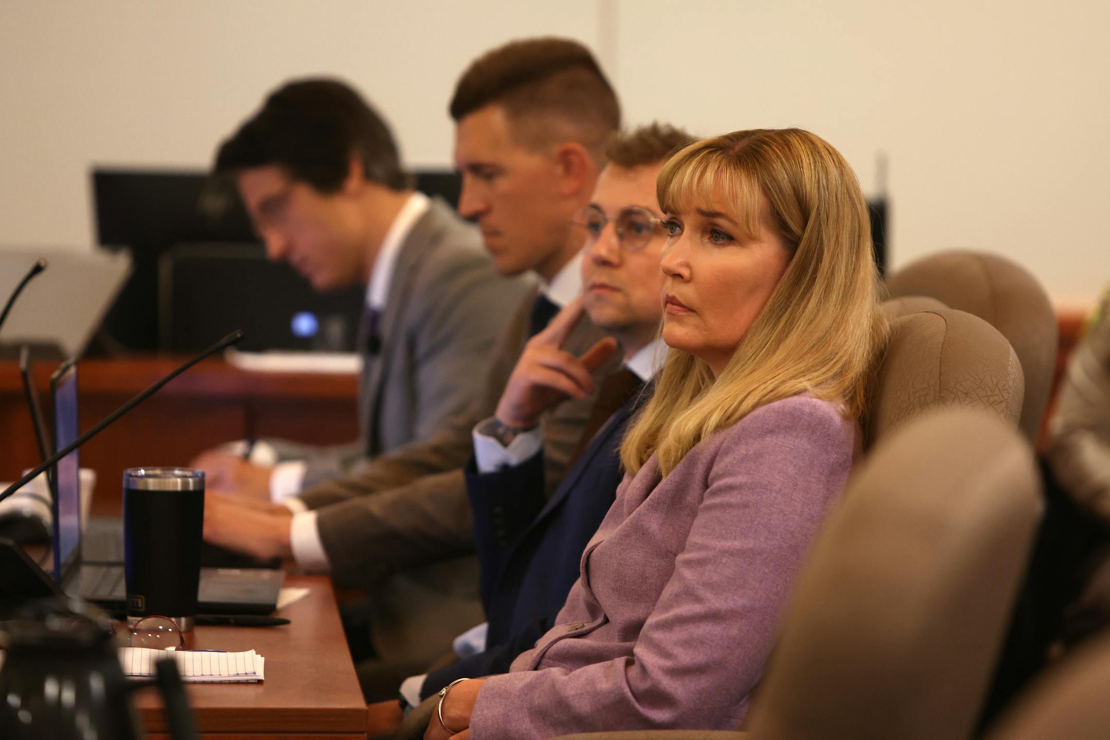 Minnesota Sen. Nicole Mitchell listens to the closing arguments of the state during the fifth day of her felony burglary trial on July 18 at Becker County District Court in Detroit Lakes. To the right of Sen. Mitchell are her attorneys Matthew Keller, Dane DeKrey and Bruce Ringstrom Jr.