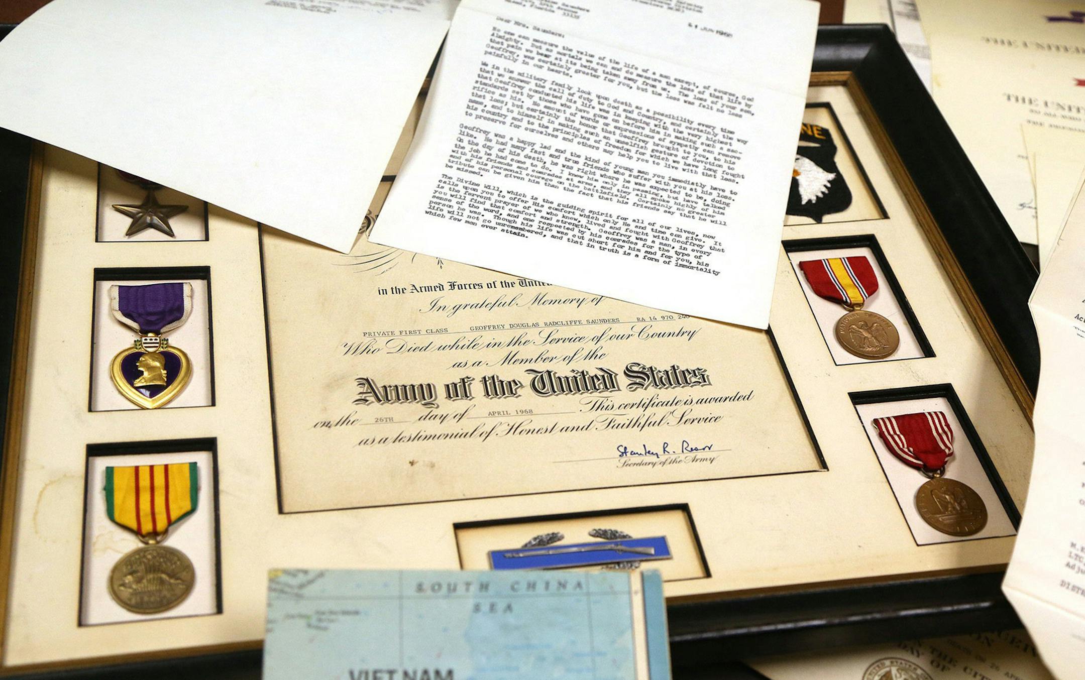 Military medals and letters belonging to Private Geoffrey Saunders, who died in Vietnam in 1968, were found by Meghan Burns of Coral Springs, Fla., while she was moving. (Carline Jean/Sun Sentinel/TNS)
