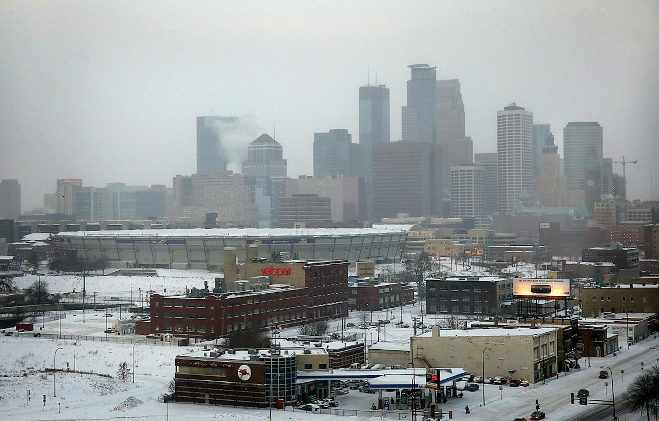 The roof of the Minnesota Vikings' Metrodome is deflated Saturday, Jan. 18, 2014 in downtown Minneapolis. The 10 acres of Teflon-coated fabric were done deflating in 35 minutes. The deflation and the demolition of the Dome beginning next week will make way for construction of a new $1 billion Vikings stadium.