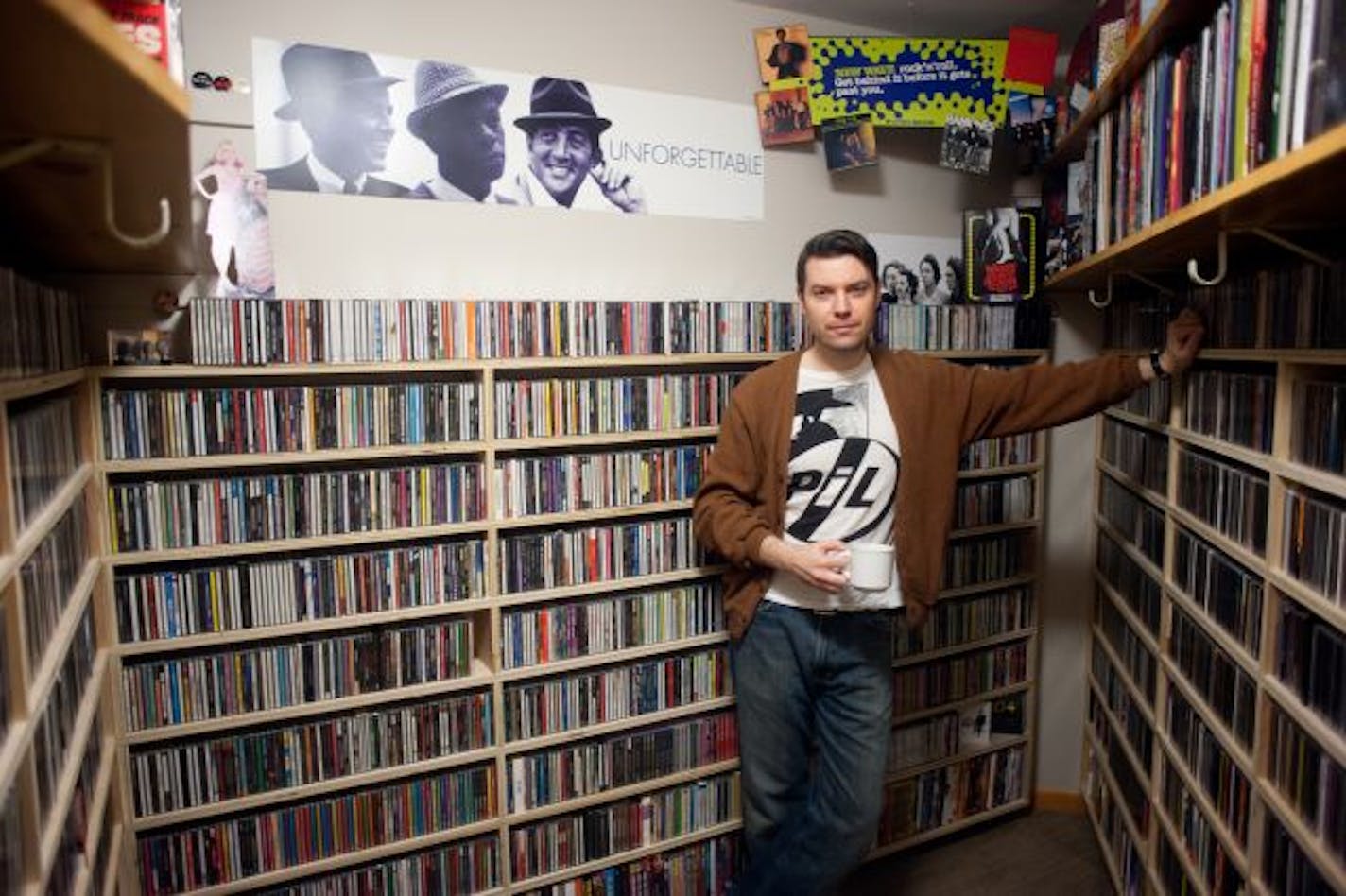 Jake Rudh has a major CD collection at his Minneapolis home.