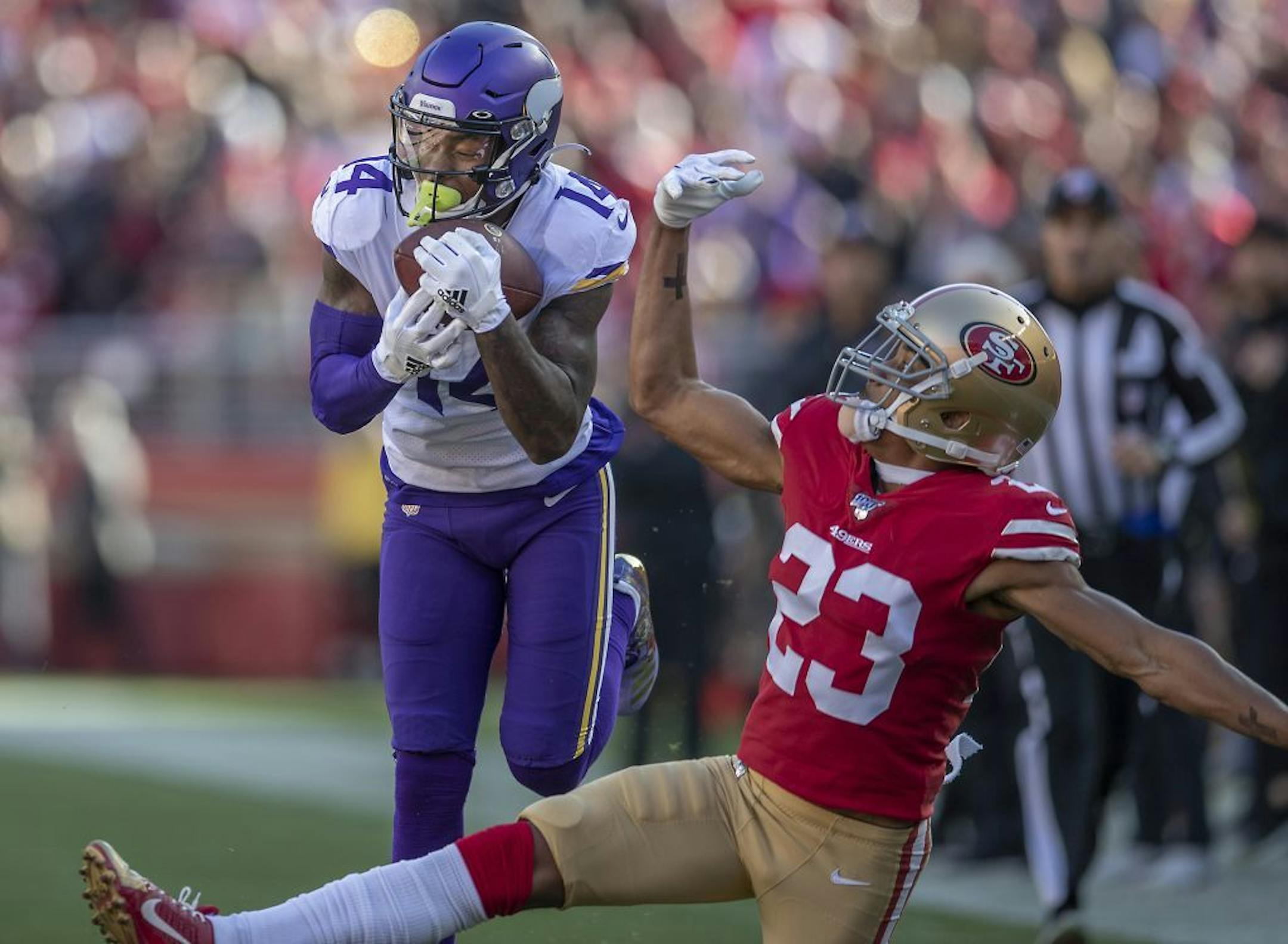 Minnesota Vikings wide receiver Stefon Diggs caught a touchdown pass over San Francisco 49ers cornerback Ahkello Witherspoon in the first quarter.
