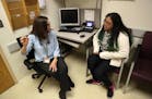 Kimberlyn Garcia, right, meets alone with pediatrician Dr. Karen Bernstein prior to the 13-year-old's mother, Gloria Garcia, joining them during an ap