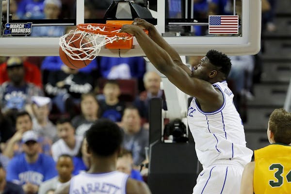 Duke's Zion Williamson dunks against North Dakota State in the first half during the first round of the NCAA Tournament at Colonial Life Arena in Colu