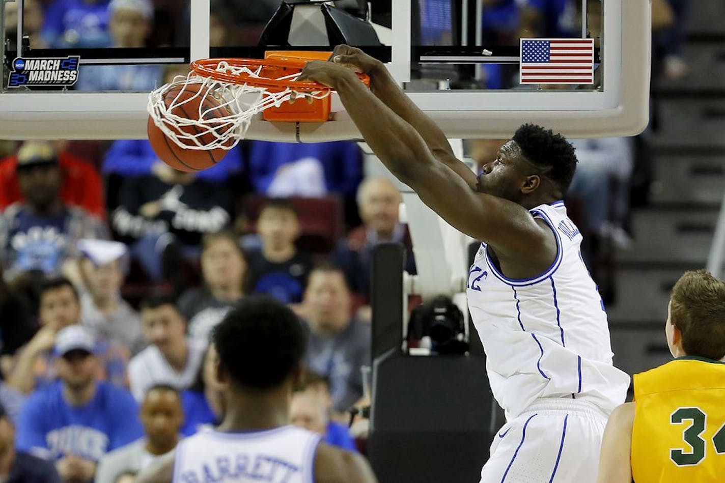 Duke's Zion Williamson dunks against North Dakota State in the first half during the first round of the NCAA Tournament at Colonial Life Arena in Columbia, S.C., on Friday, March 22, 2019. Duke advanced, 85-62.