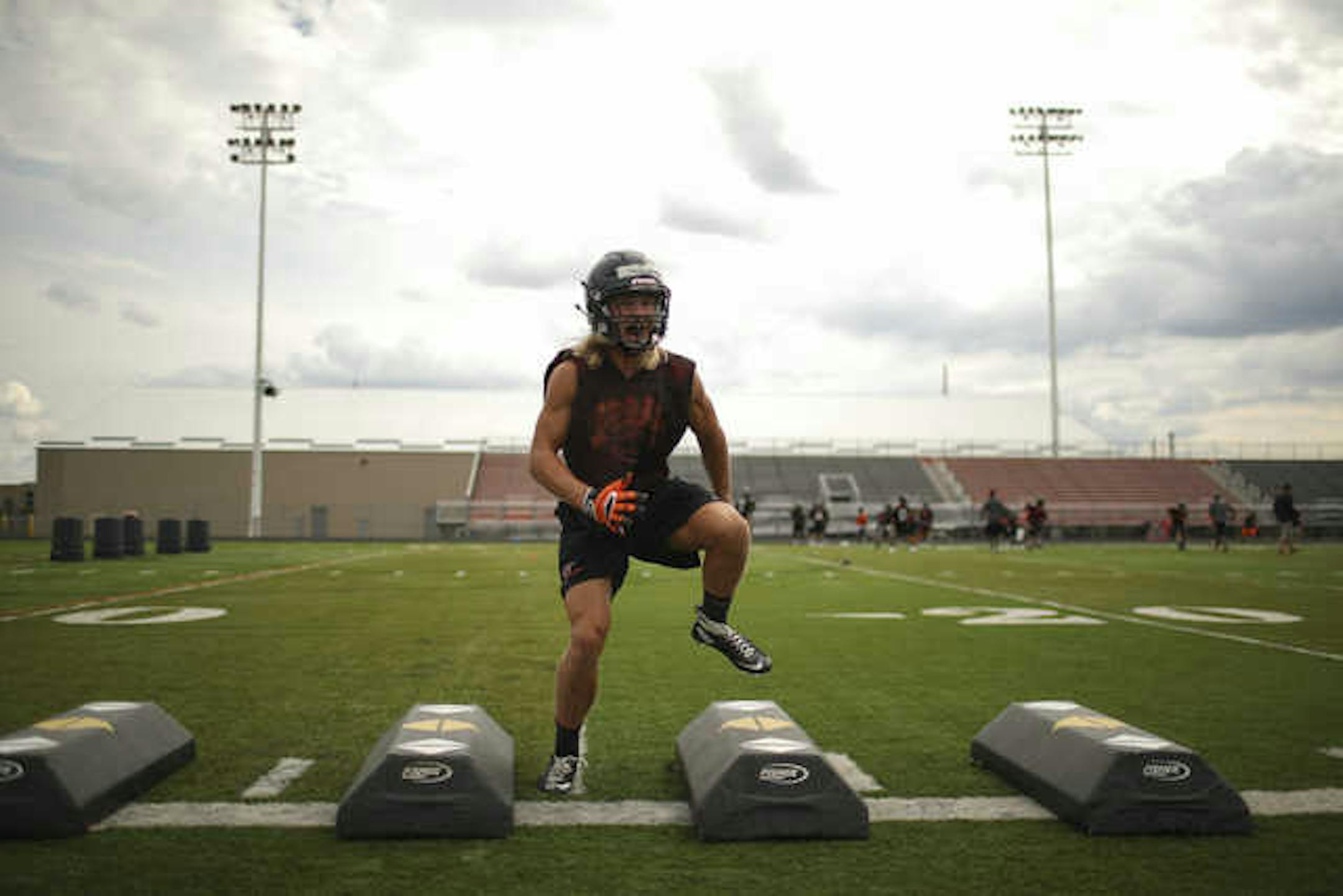 Nick Norman, a senior linebacker for 2015 Class 6A state champion Osseo, went through drills during Monday's first day of practice. And he wasn't shy about where he wants the season to end. "I'm really looking forward to playing in the new U.S. Bank Stadium." That's the site of the Prep Bowl.