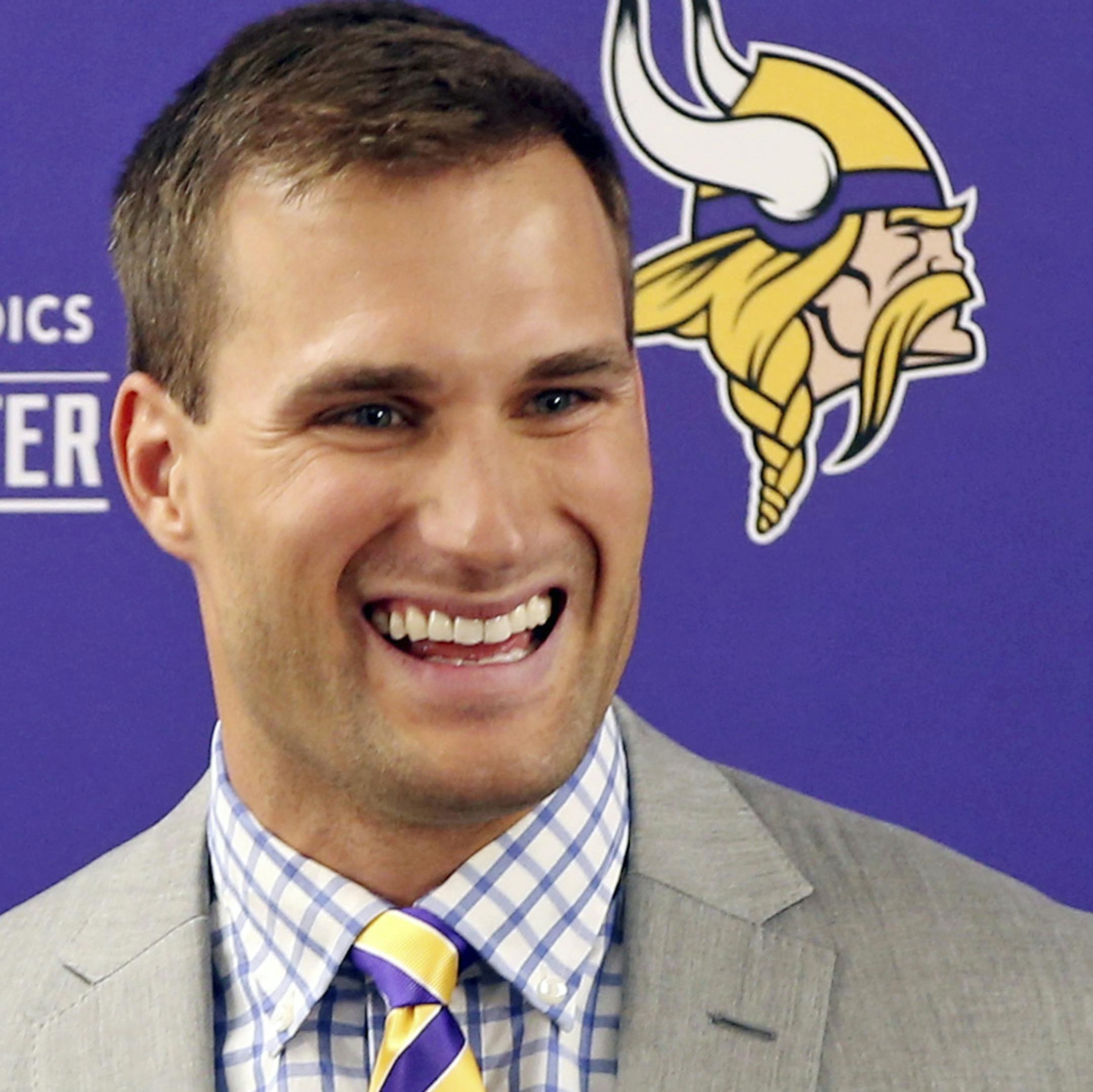 Minnesota Vikings new quarterback Kirk Cousins addresses the media after he was introduced during a news conference, after signing a three-year, $84 million contract, at the NFL football team's new headquarters Thursday, March 15, 2018, in Eagan, Minn. (AP Photo/Jim Mone) ORG XMIT: MIN2018033012484624