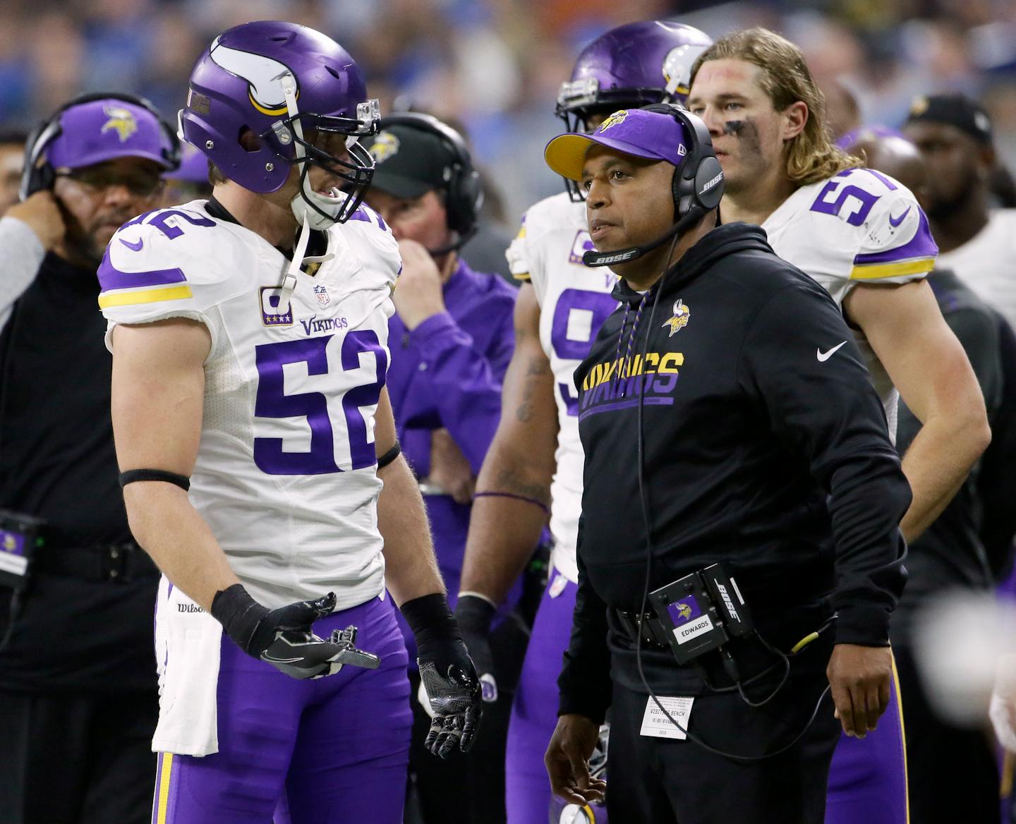 Minnesota Vikings outside linebacker Chad Greenway (52) talks with defensive coordinator George Edwards during the second half of an NFL football game against the Detroit Lions, Thursday, Nov. 24, 2016 in Detroit.