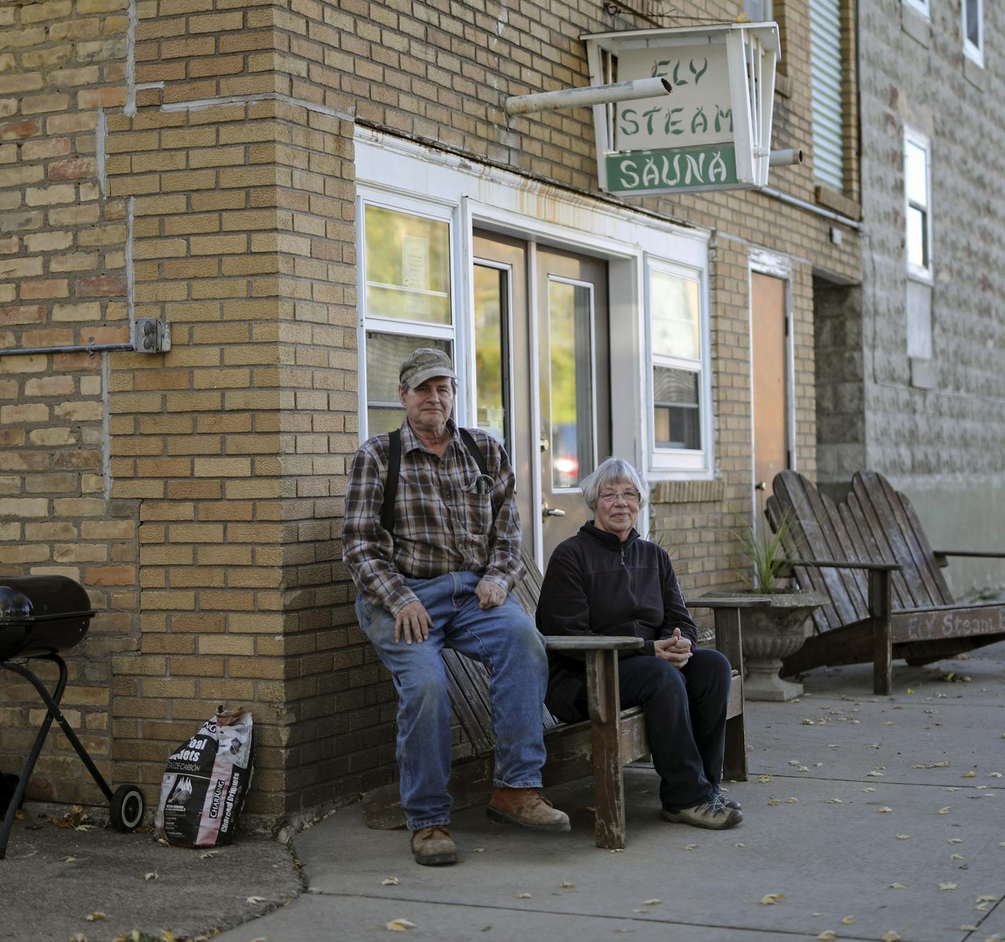 For $7, the Ely Steam Sauna offers a true Finnish experience -- and a dry towel. Open since 1915, the old-fashioned Finnish traditional spot might be the longest-running public sauna in the state. Here, In an unassuming building a few blocks from Ely's main throughfare, owners Rick and Nancy Petrzilka sit in the cooling chairs outside the Ely Steam Sauna. brian.peterson@startribune.com
Ely, MN 10/11/2017