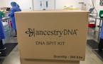 Workers at Spectrum Solutions in Draper, Utah, process DNA spit kits before they are sent to customers of Ancestry.com on April 16, 2018. Spectrum is 