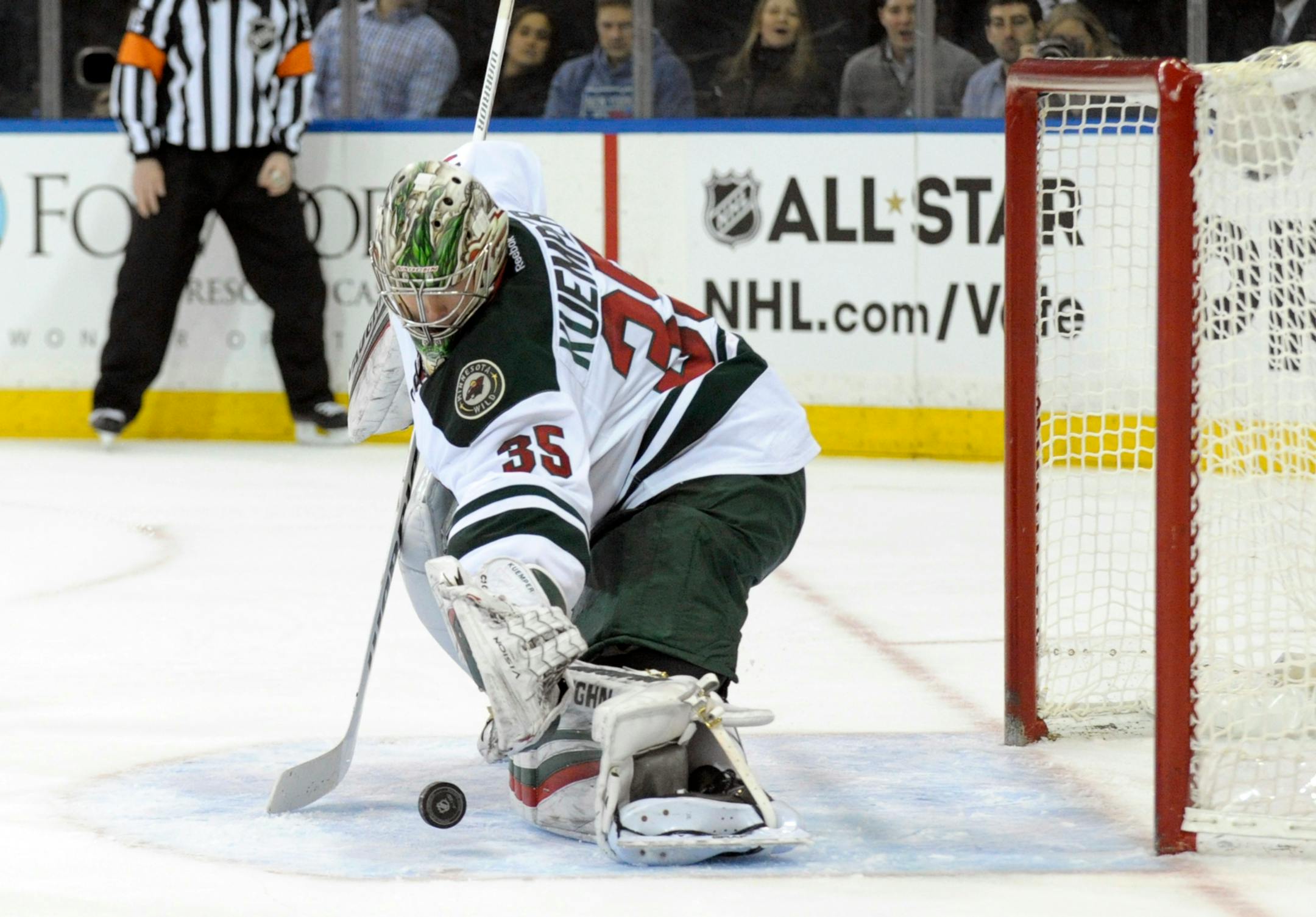 Minnesota Wild goaltender Darcy Kuemper makes a save during the second period of an NHL hockey game against the New York Rangers on Friday, Dec. 23, 2016, at Madison Square Garden in New York. (AP Photo/Bill Kostroun)
