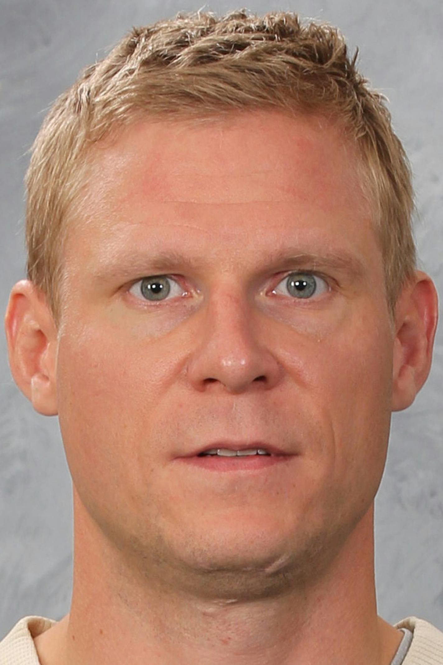 ST. PAUL, MN - SEPTEMBER 17: Mikko Koivu #9 of the Minnesota Wild poses for his official headshot for the 2015-2016 season on September 17, 2015 at the Xcel Energy Center in St. Paul, Minnesota. (Andy King/NHLI via Getty Images) *** Local Caption *** Mikko Koivu ORG XMIT: 570172171